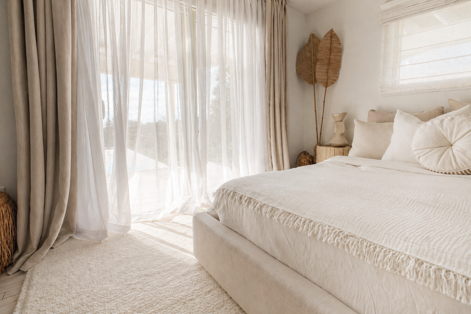 Bedroom with sheer curtains